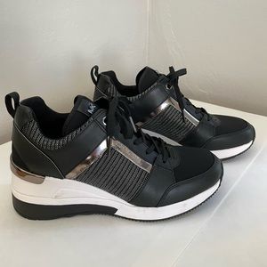Michael Kors Fashion Sneaker. Like new. Never worn. True to size. 7.5